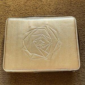 NWOT Lancôme golden colored makeup bag